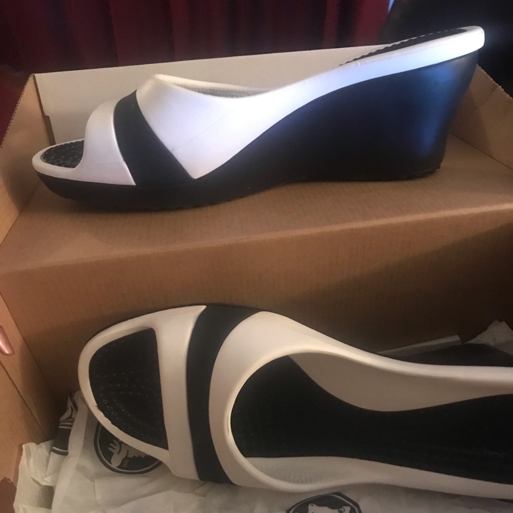 Black and white wedge crocs